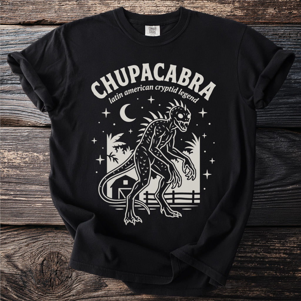 Black t-shirt with a Chupacabra graphic and text: "Chupacabra latin american cryptid legend".