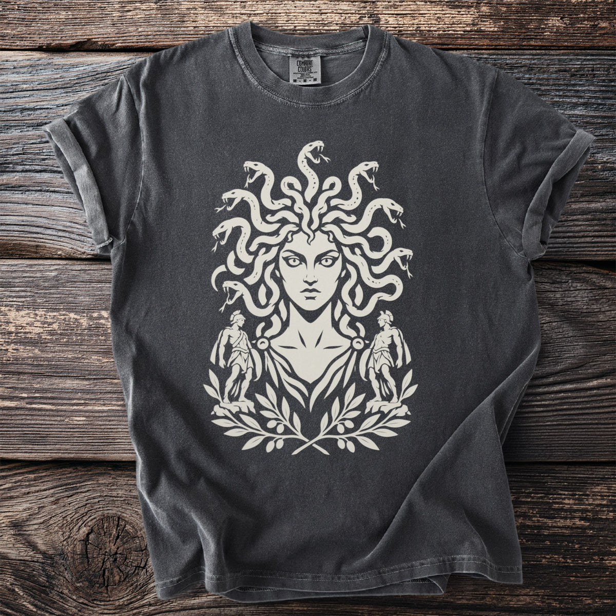 Dark gray t-shirt with a white Medusa graphic and laurel wreath.