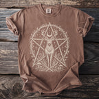 Brown t-shirt with a large, cream-colored deer wearing a crescent moon in a linework pentagram design.