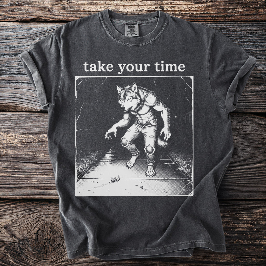 Dark grey t-shirt with graphic of a werewolf and the text "take your time".