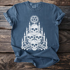 Blue t-shirt with white graphic of skulls, candles, bones, and a pentagram.
