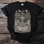 Black t-shirt featuring Thor's hammer, trees, birds, candles, and runes.