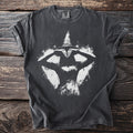 Dark gray t-shirt with a white grunge graphic of a witch with a conical hat.