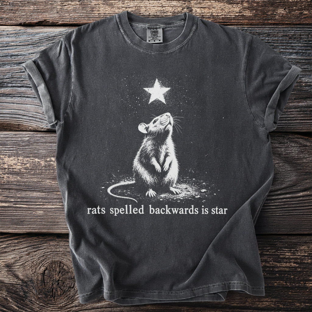 T-shirt with graphic of a rat looking up at a star, text "rats spelled backwards is star."