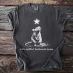 T-shirt with graphic of a rat looking up at a star, text "rats spelled backwards is star."