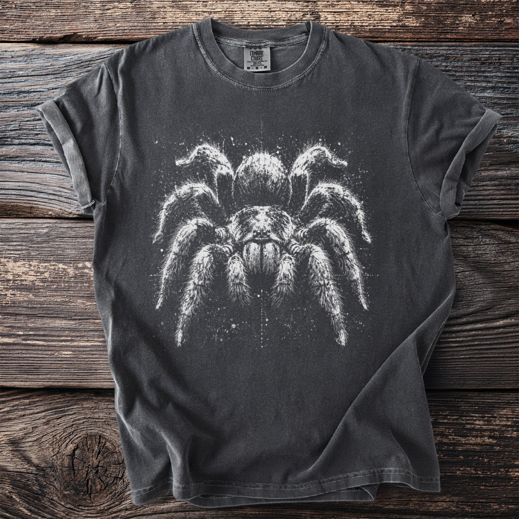 Charcoal t-shirt with a white fuzzy tarantula graphic and Comfort Colors label.