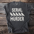 Charcoal t-shirt with white text "SERIAL MURDER" and five crows.