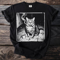Black t-shirt with a graphic of a grumpy cat with a cigarette and coffee mug.