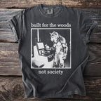 T-shirt with wolf-man at computer and text "built for the woods not society".