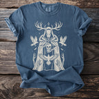 Blue t-shirt with a beige graphic of a skeletal figure wearing antlers and holding a skull.