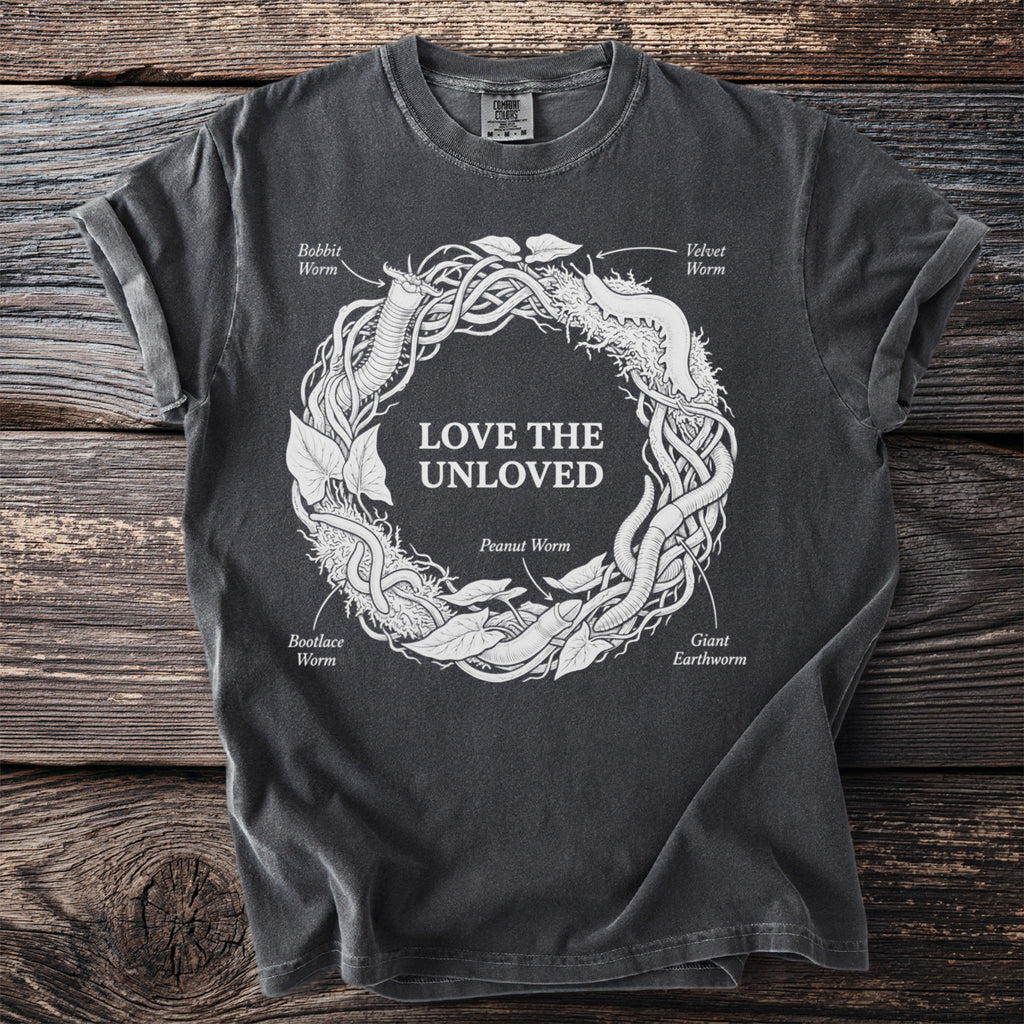 Dark gray t-shirt featuring a circular design of various worms and the text "Love the Unloved".