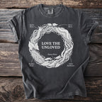 Dark gray t-shirt featuring a circular design of various worms and the text "Love the Unloved".