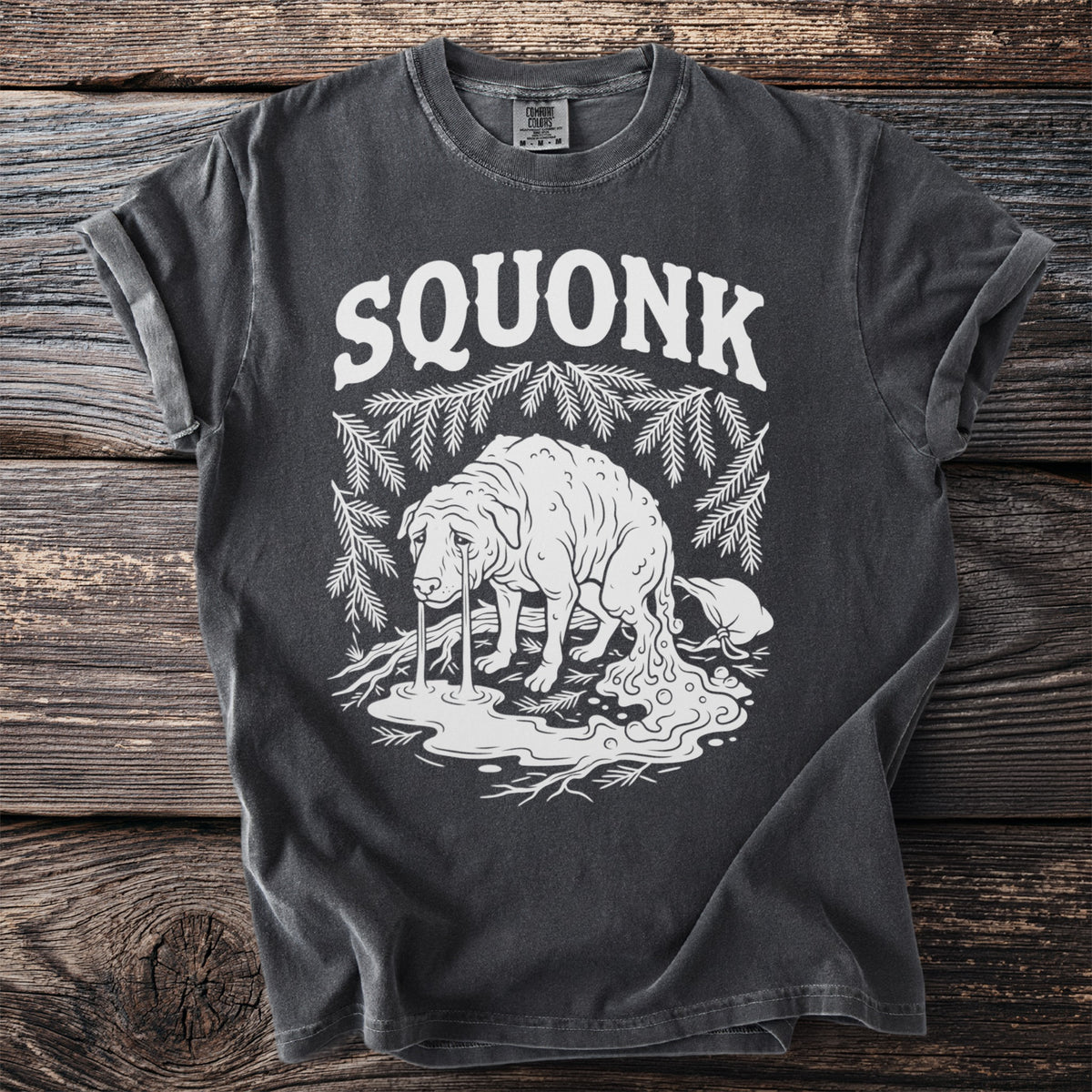 Dark gray t-shirt with white text "SQUONK" above a weeping dog with dripping tears and body.
