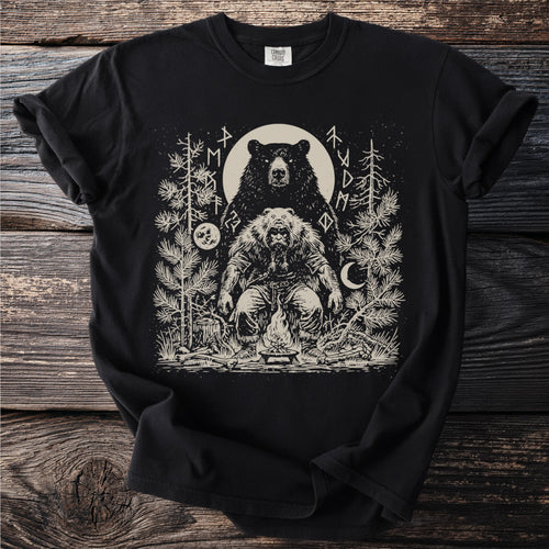 Illustration of a seated bear-man by a campfire with a bear above him.