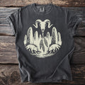 Dark gray t-shirt with ram skull, stones, feathers, and wolves graphic.
