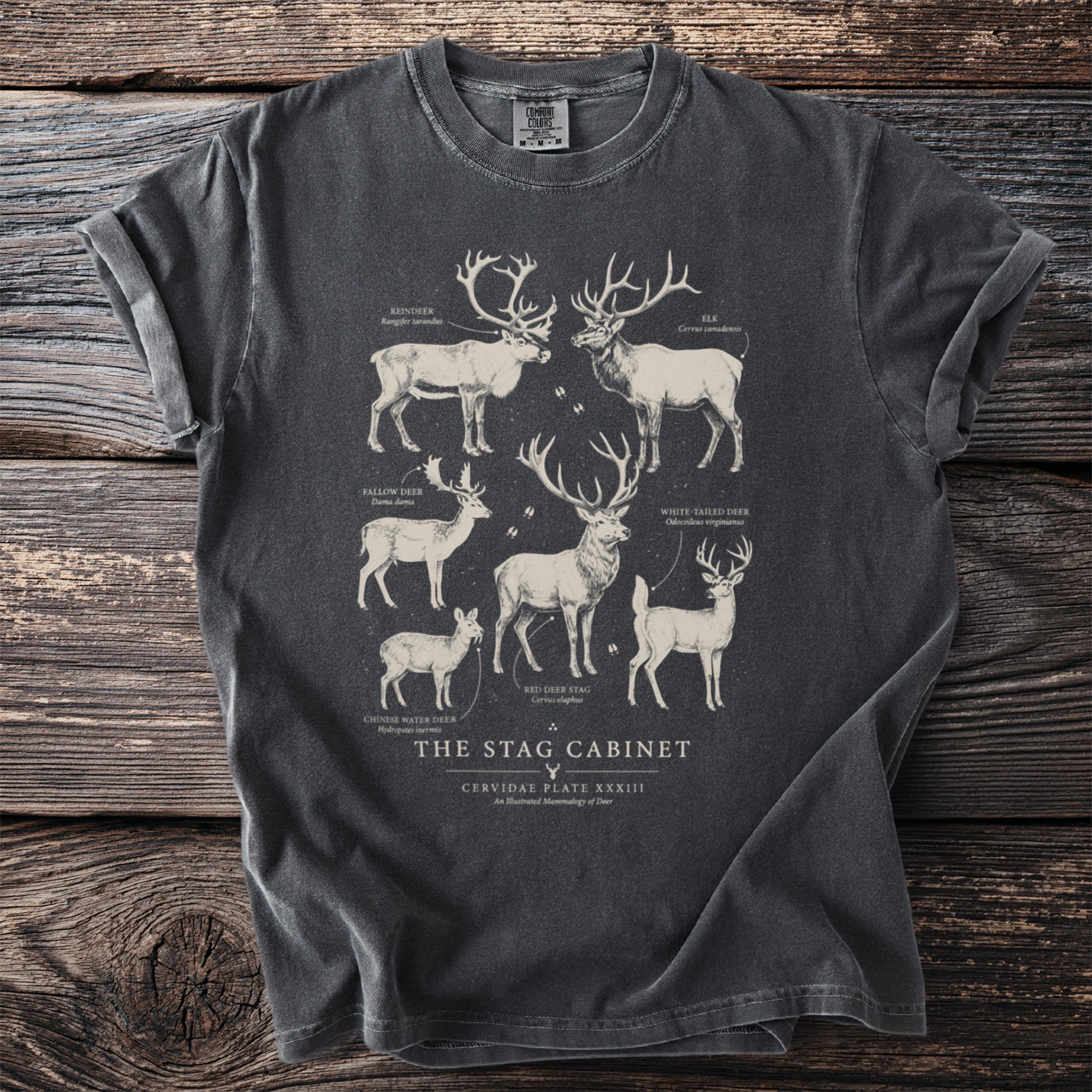 Dark grey t-shirt featuring "The Stag Cabinet" print with illustrations of six deer species.