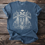Blue t-shirt with a Nordic-inspired gate, wolves, and eagle graphic.