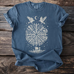 Blue t-shirt with white Norse symbols, two ravens, moon, and a Viking ship.
