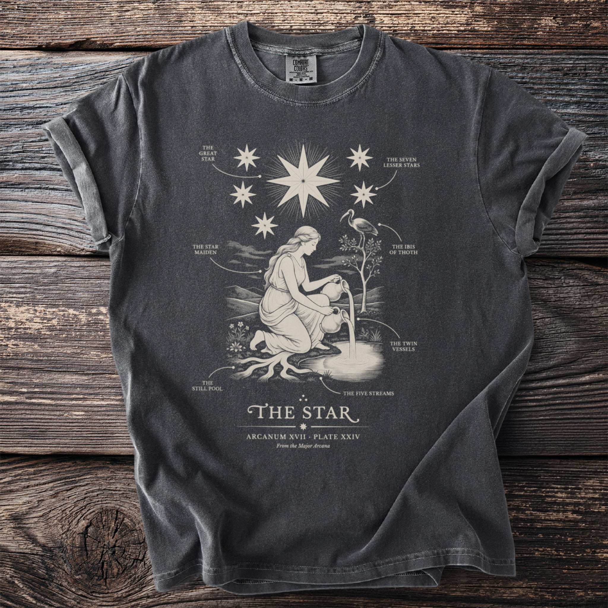 T-shirt with "The Star" tarot card illustration and descriptive text.