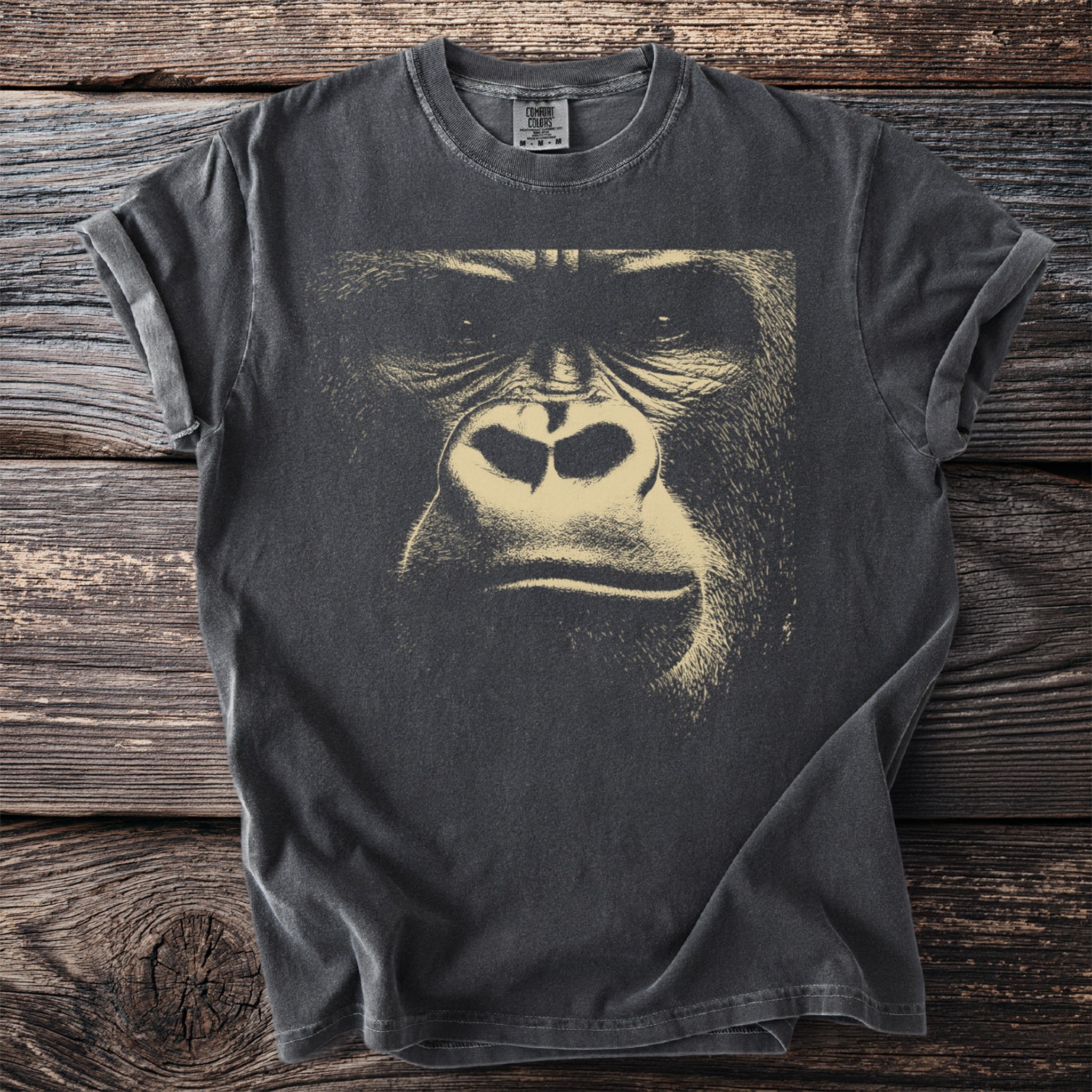 Charcoal t-shirt with a detailed close-up portrait of a gorilla's face.