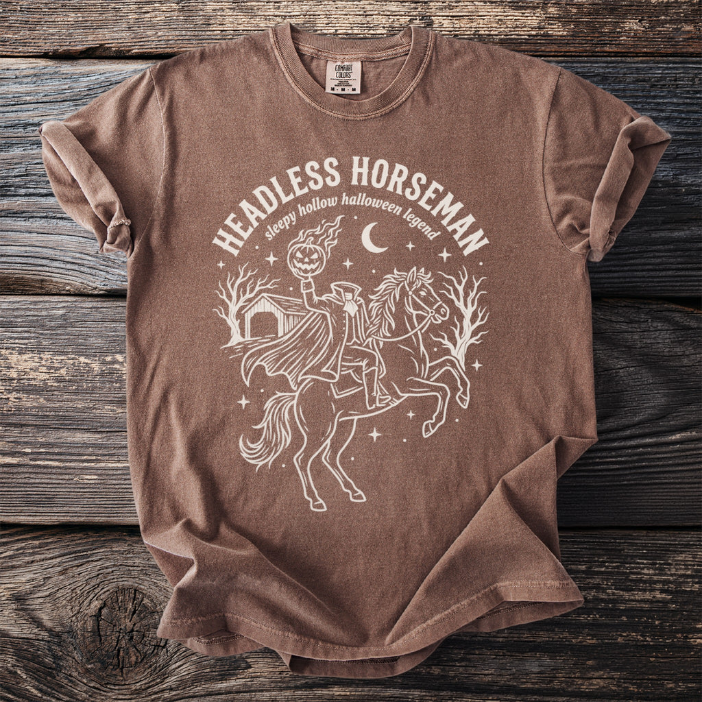 Brown t-shirt with Headless Horseman graphic and text "sleepy hollow halloween legend"