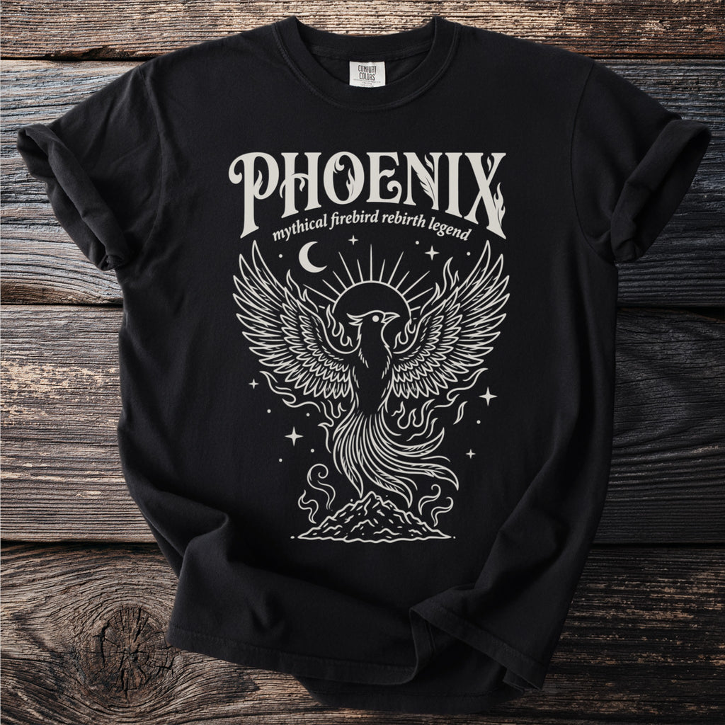 Black t-shirt with white phoenix graphic and text "PHOENIX mythical firebird rebirth legend".