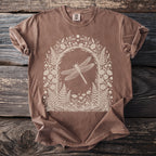 Brown t-shirt with off-white dragonfly and botanical art on the front.