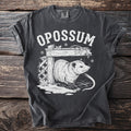 Dark grey t-shirt with white opossum graphic and "OPOSSUM" text.