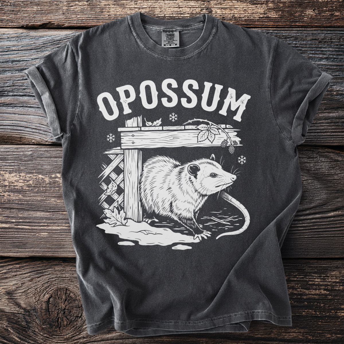 Dark grey t-shirt with white opossum graphic and "OPOSSUM" text.