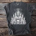 Dark t-shirt with white skull pile, candles, and pentagram graphic.