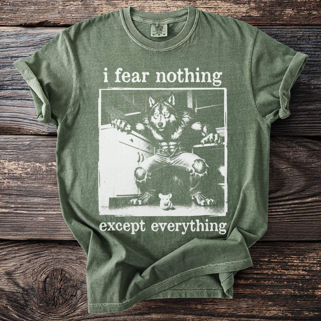 Green t-shirt with a werewolf and mouse graphic, reads "i fear nothing except everything".