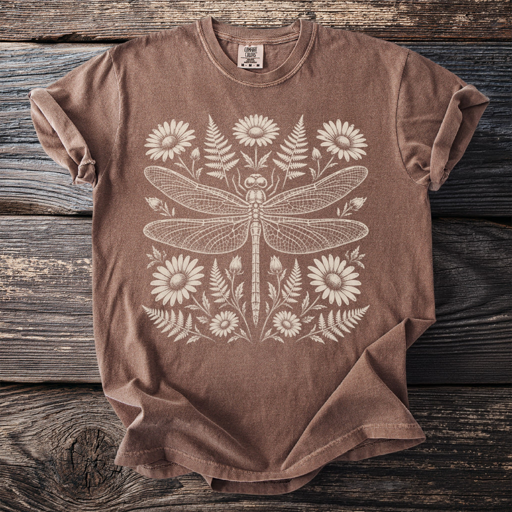 Brown t-shirt with cream-colored dragonfly and botanical print.