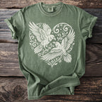 Green t-shirt with white print of two birds and a heart design.