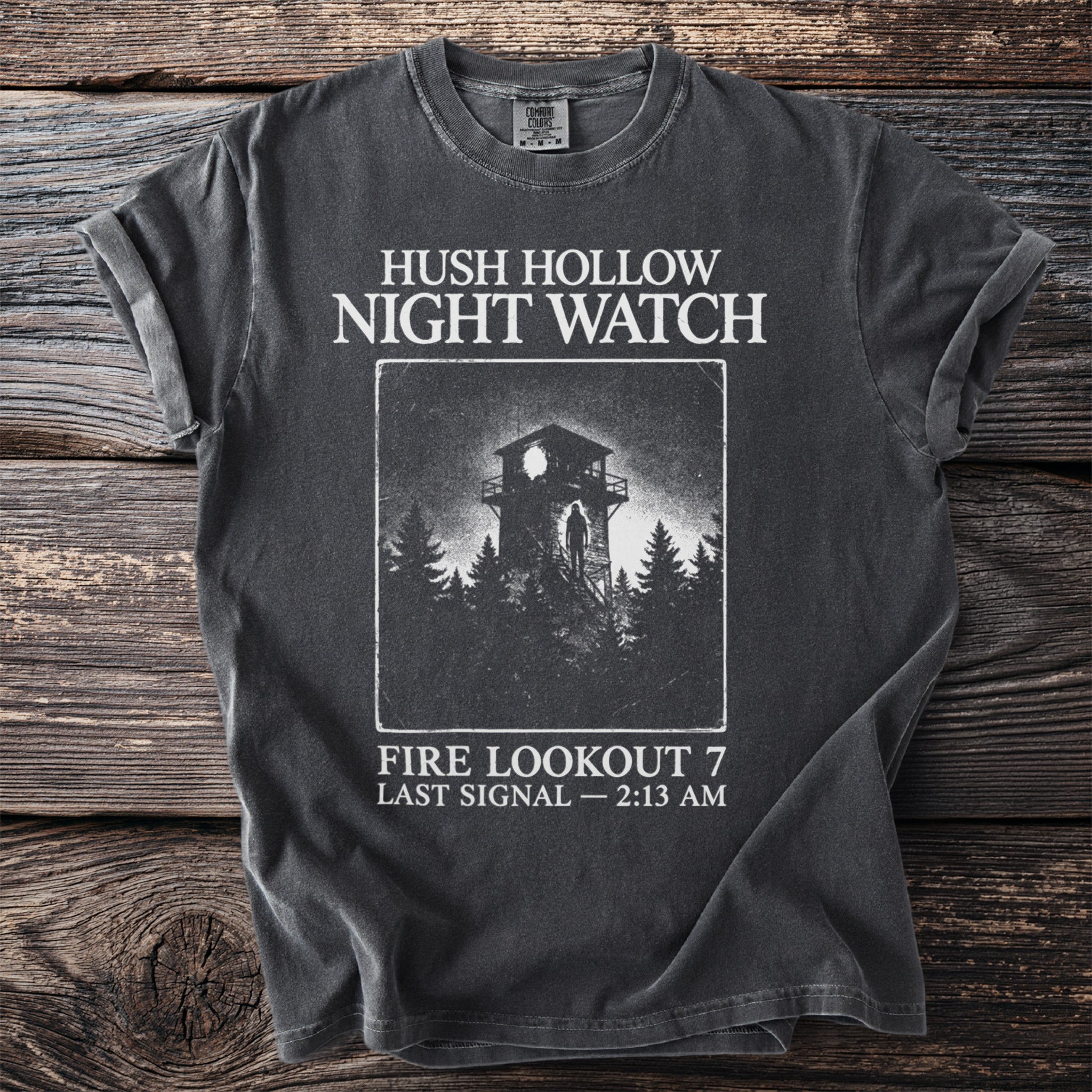 Dark grey t-shirt with Hush Hollow Night Watch and fire lookout graphic.