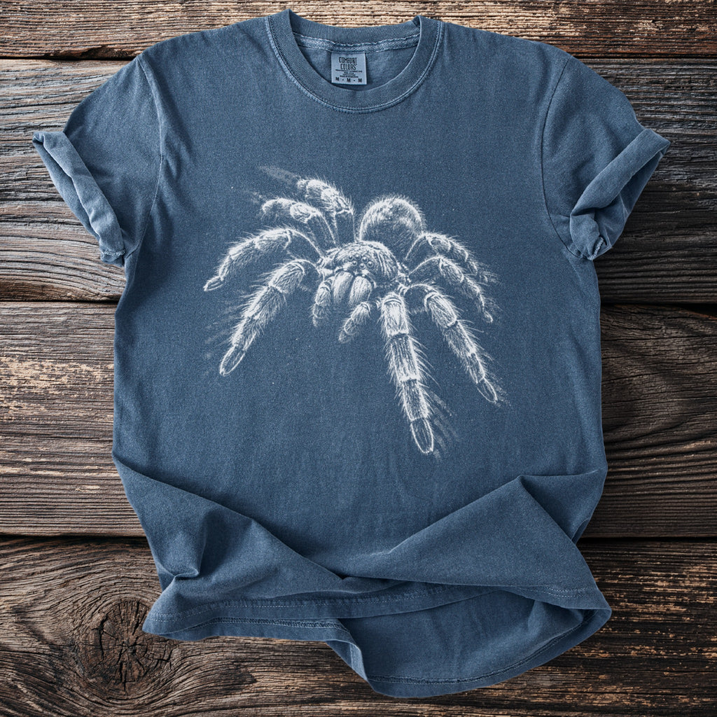 Blue t-shirt with a white tarantula graphic and Comfort Colors tag.