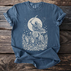 Celestial goddess riding a chariot pulled by cats, with sword raised against a moonlit sky.