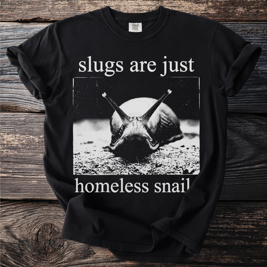 Black t-shirt with white text "slugs are just" above a close-up of a snail and text "homeless snail".