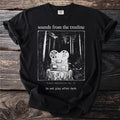 Black t-shirt with "sounds from the treeline" and ominous forest scene.