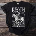 Black t-shirt with white graphic of a skeleton on horseback holding a flag, with text "DEATH."