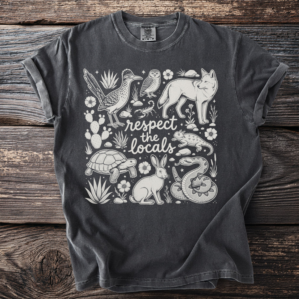 T-shirt with desert animals and "respect the locals" text.