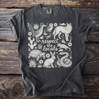 T-shirt with desert animals and "respect the locals" text.