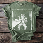 Green t-shirt with graphic of a wolfman at a laptop saying "this could have been an email."