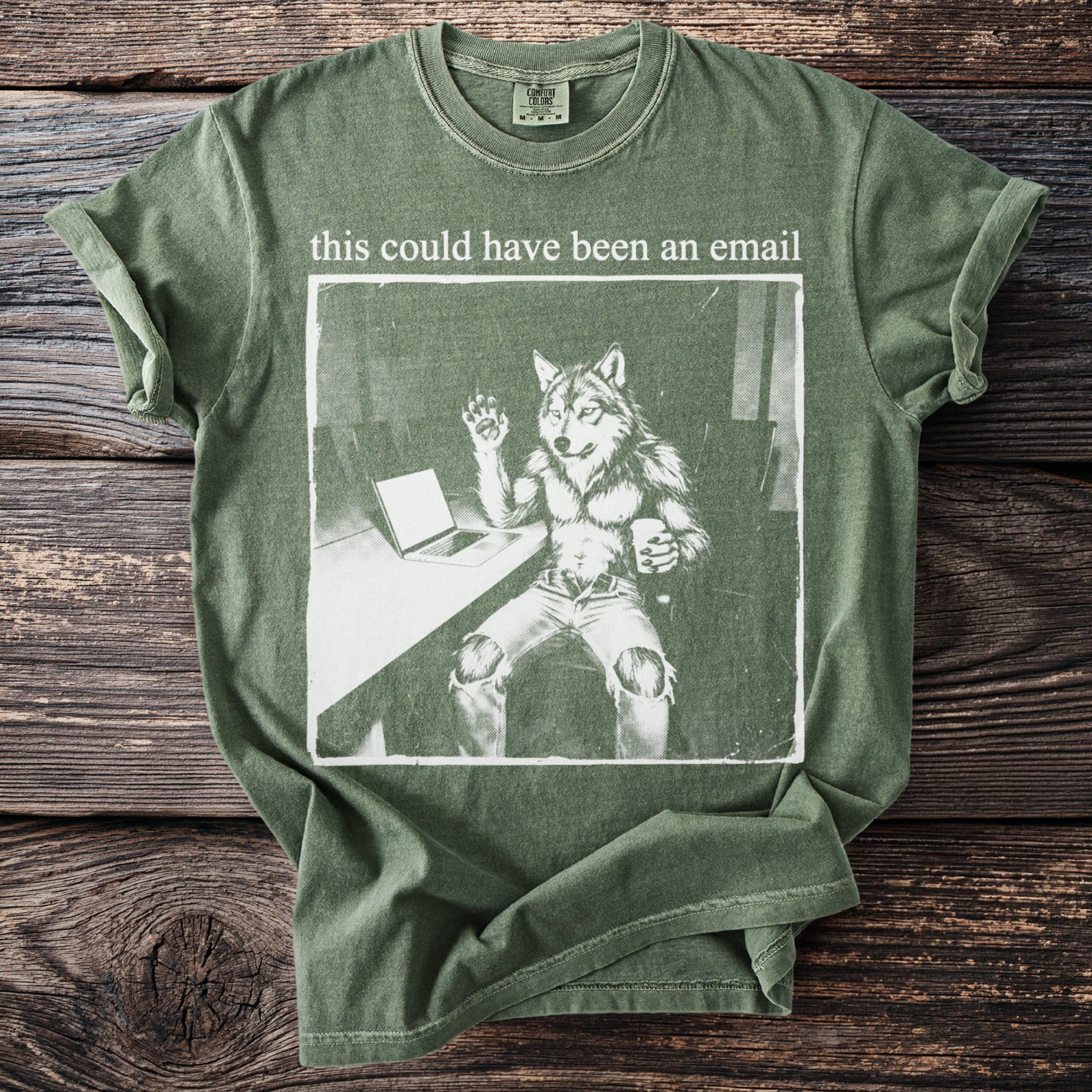 Green t-shirt with graphic of a wolfman at a laptop saying "this could have been an email."