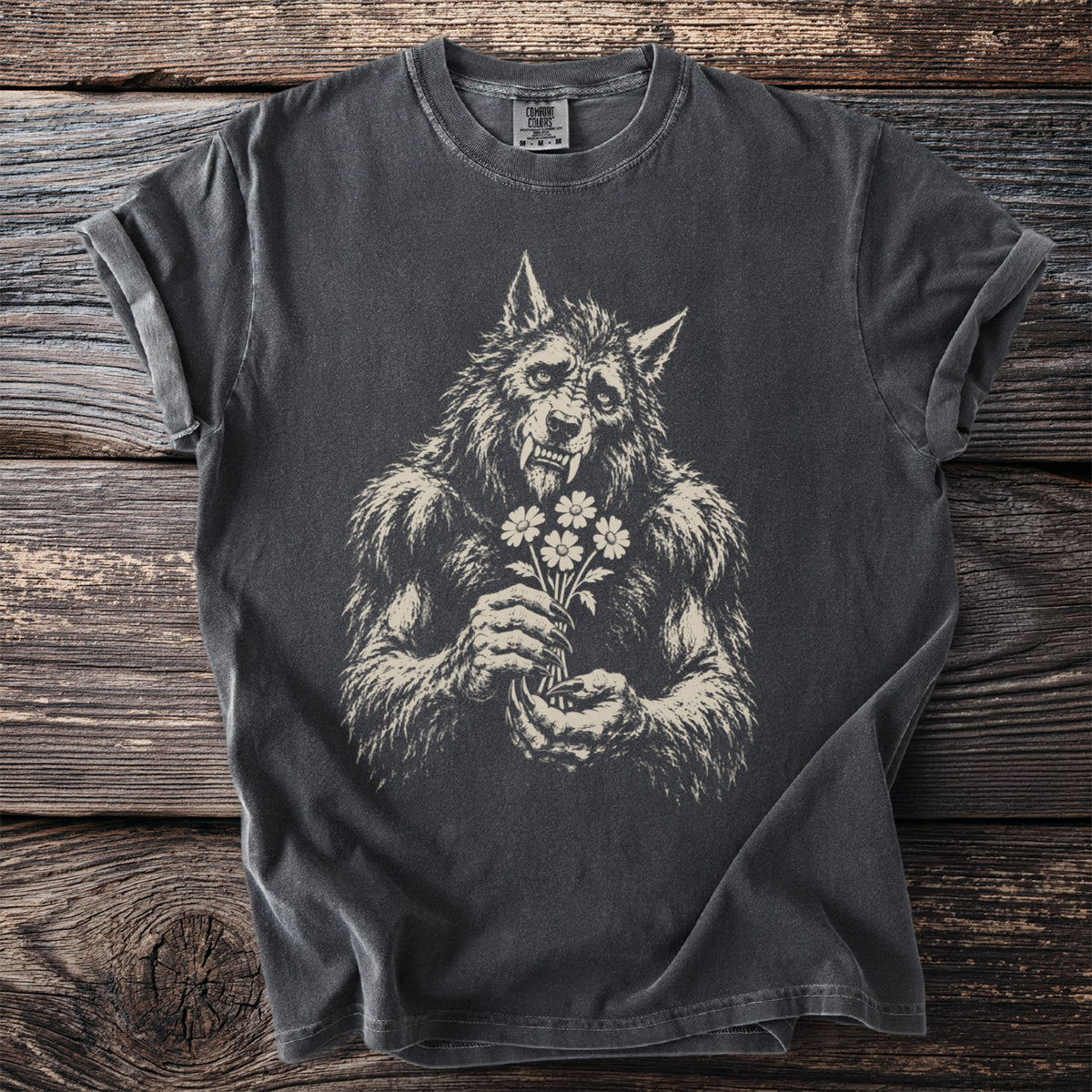Dark grey t-shirt with a vintage style werewolf holding a bouquet of daisies graphic.