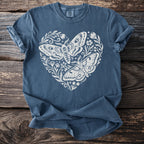 Blue t-shirt with a white floral heart design featuring two moths.