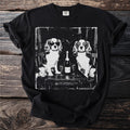 Black t-shirt with vintage print of two dogs, sunglasses, champagne, and glasses.