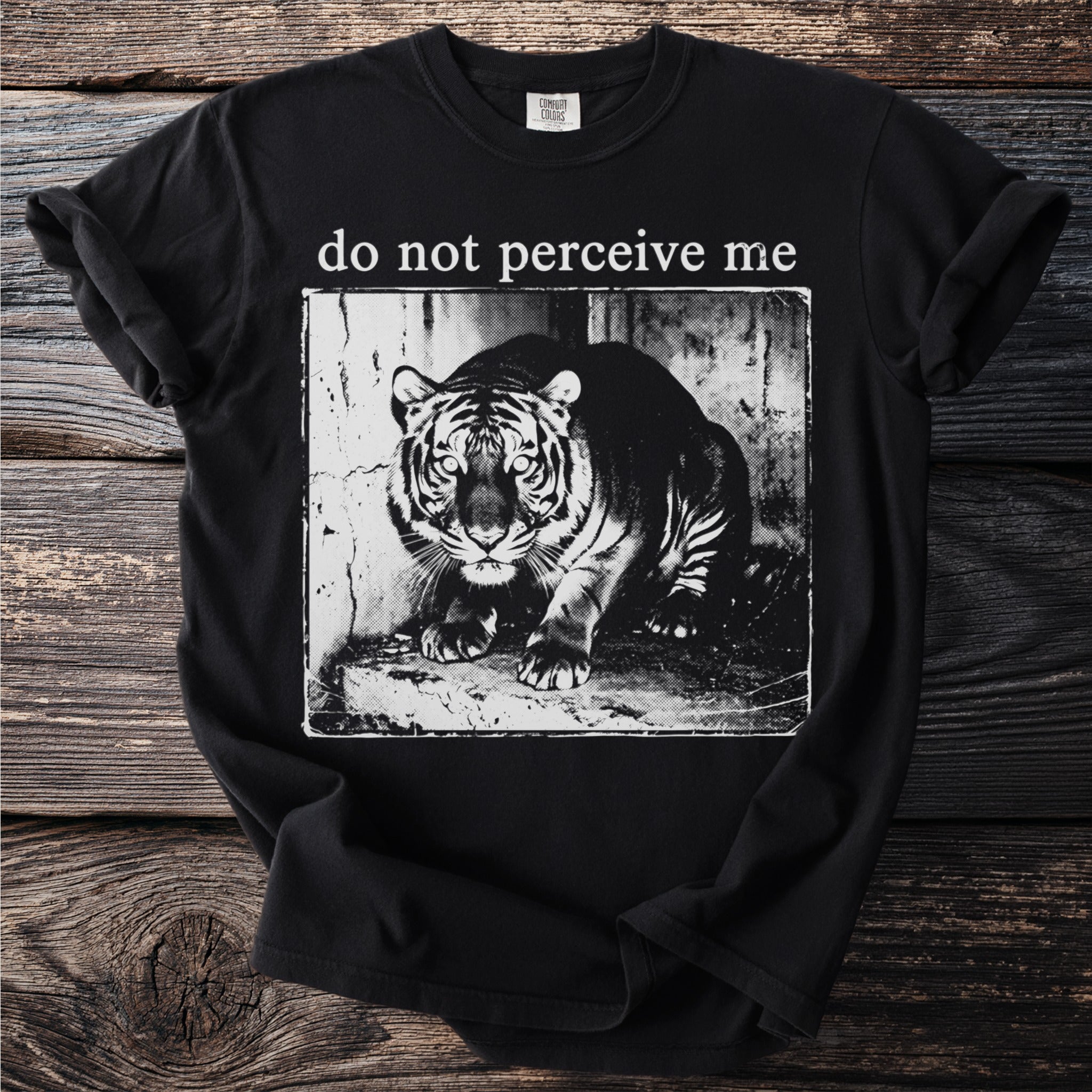 Black t-shirt with a distressed graphic of a tiger and the text "do not perceive me".
