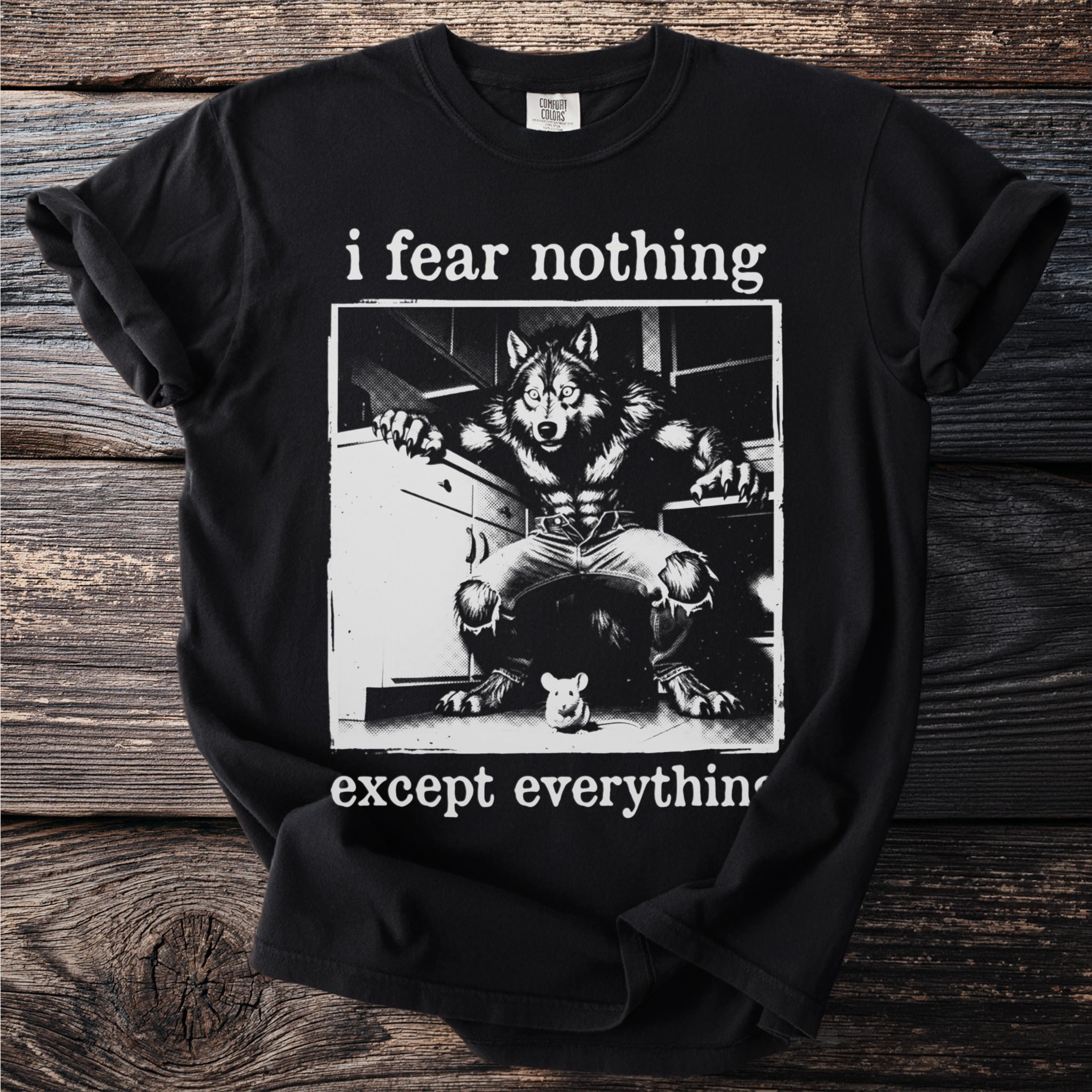Werewolf in a kitchen with a mouse, text says "i fear nothing except everything".