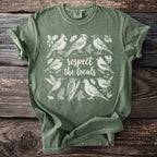 Green t-shirt with various birds and text "respect the locals".