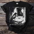 Black t-shirt with graphic of raven at sink and "i do not wish to be percei" text.